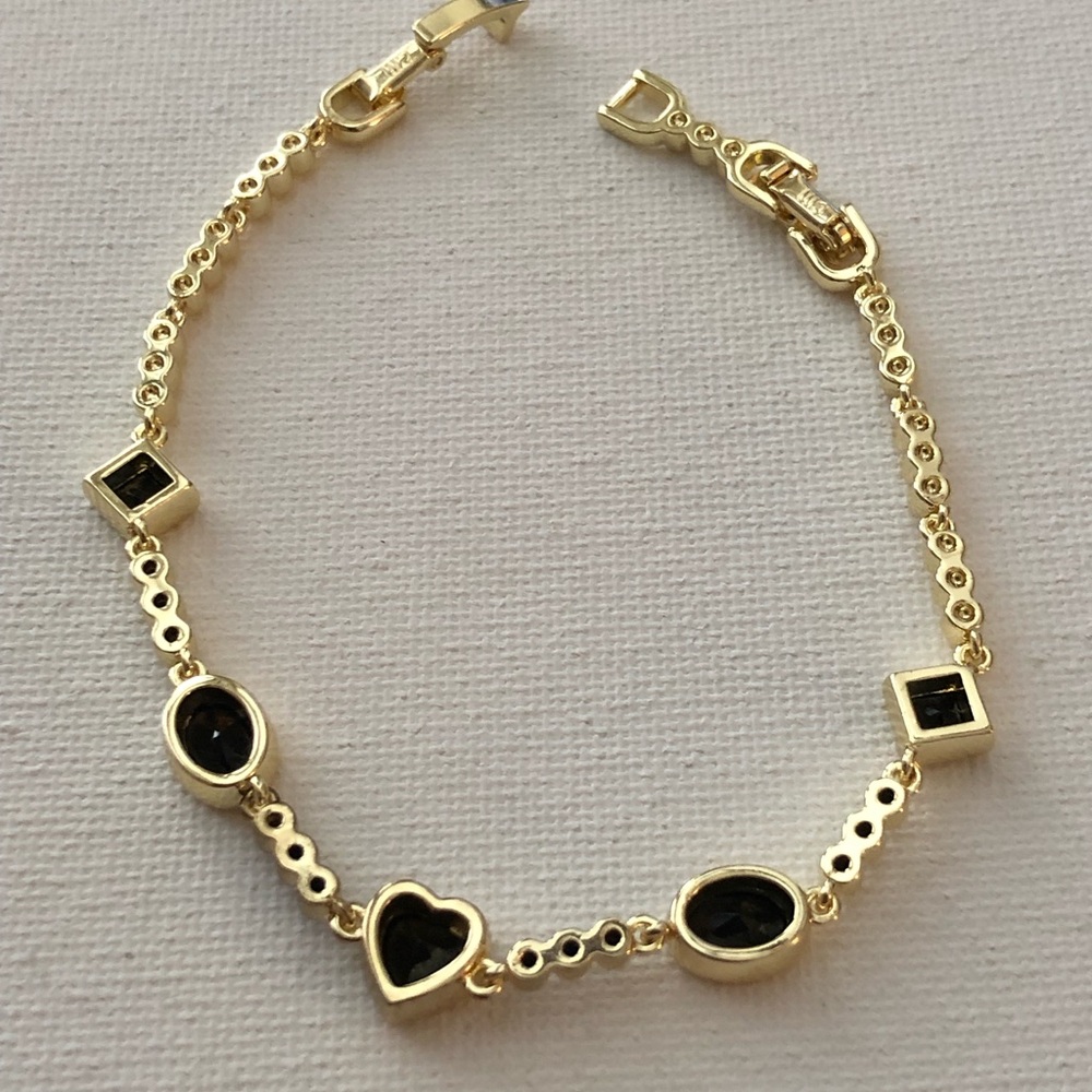 Gold-Tone Bracelet with Black Stone Accents